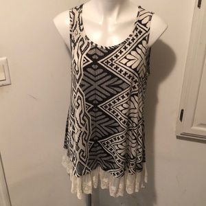 Sleeveless top with lace bottom